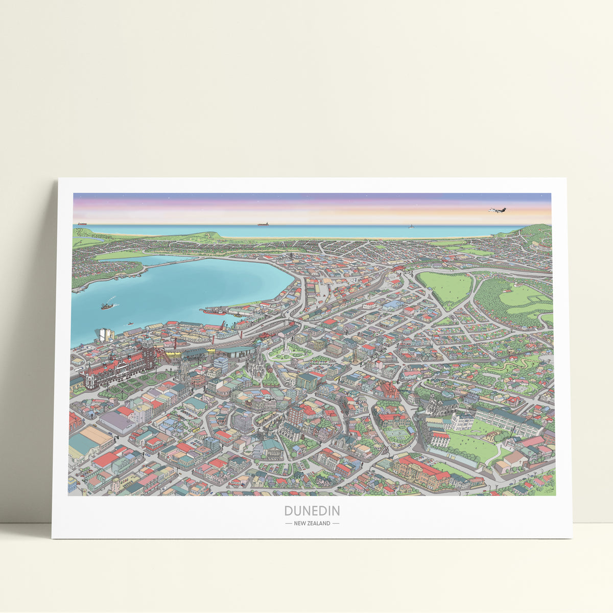 Hand-drawn map art print of Dunedin, New Zealand – detailed pen and digital colour, featuring the Octagon, city buildings, and ocean on the horizon.
