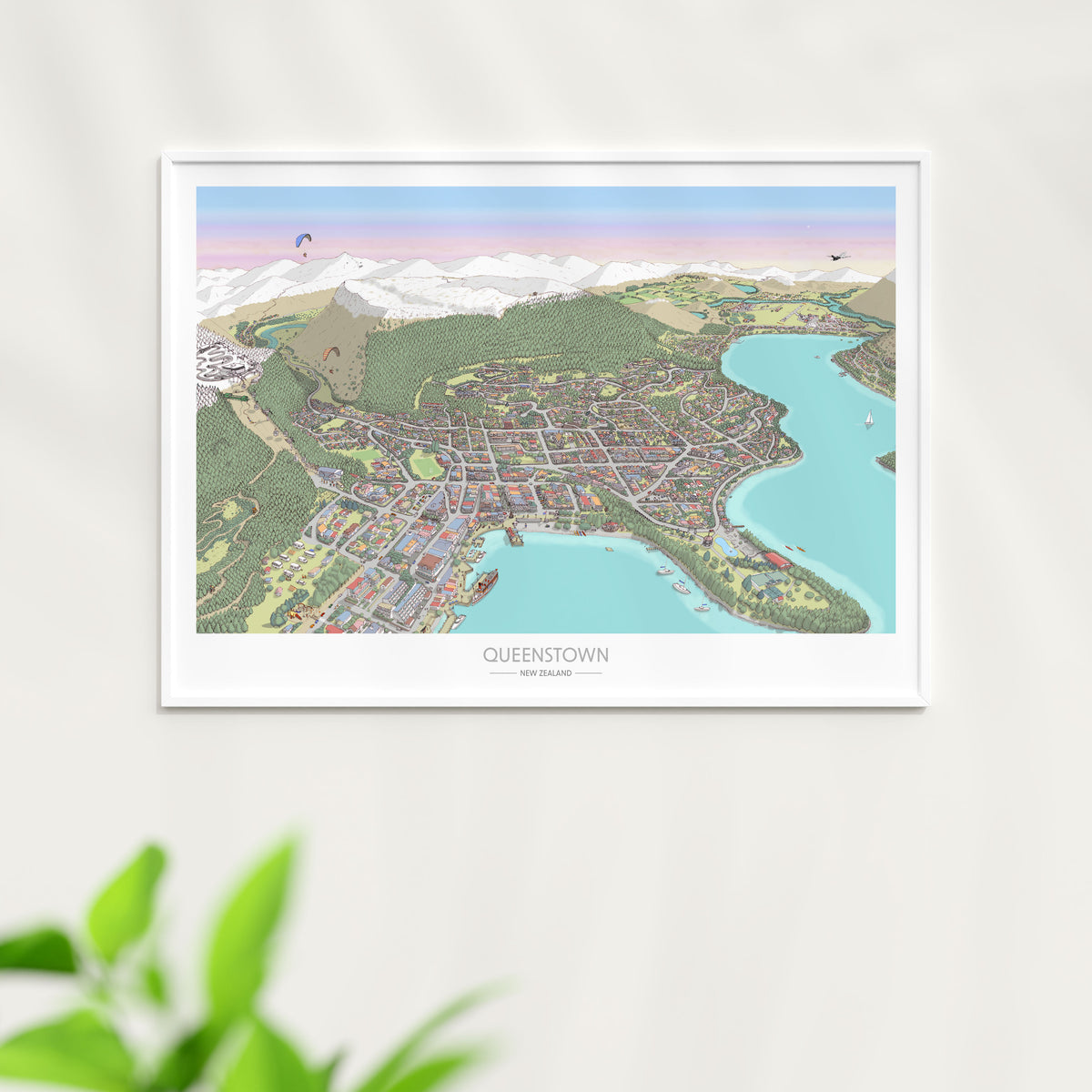 Hand-drawn map of Queenstown, New Zealand, featuring the town centre, waterfront, gondola and luge tracks, surrounding buildings, and Lake Wakatipu. Created in a detailed illustration style with digital colouring over pencil and pen. Displayed in white frame.