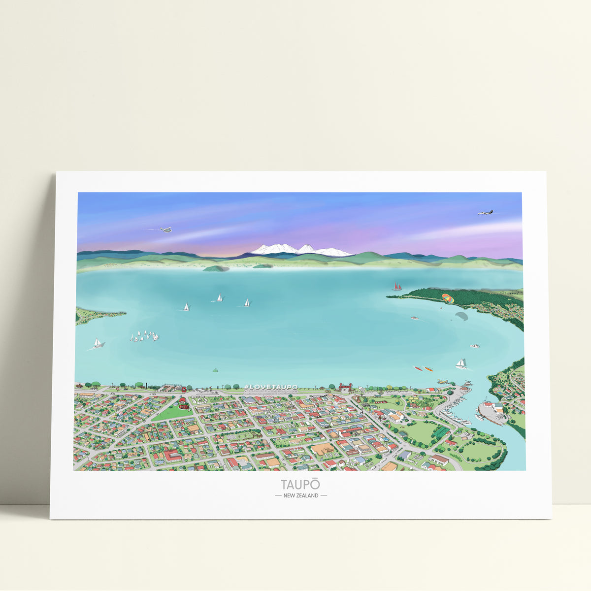 A hand-drawn map of the Taupo area in New Zealand, printed on a white background, with digital colours including a lake, city, and surrounding landscapes.