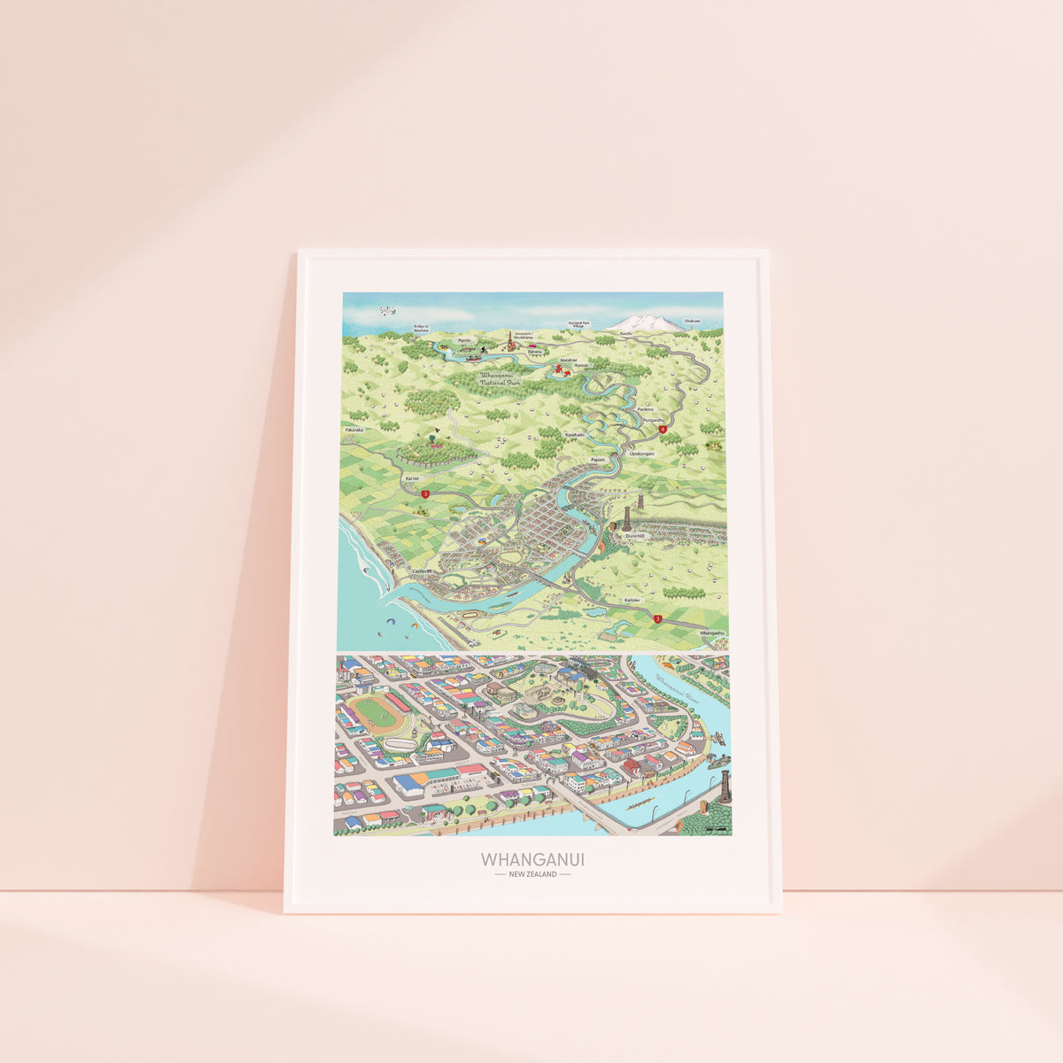 A hand-drawn map of Whanganui art print created in two parts for a District Council project. One part focuses on the city, the other on the wider region of Whanganui, New Zealand. The map highlights the Whanganui River, the Opera House, old houses, the paddle steamer, Durie Hill, the Memorial Tower, and the bridges. White framed.